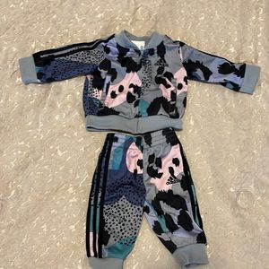 Adidas multi colored track suit